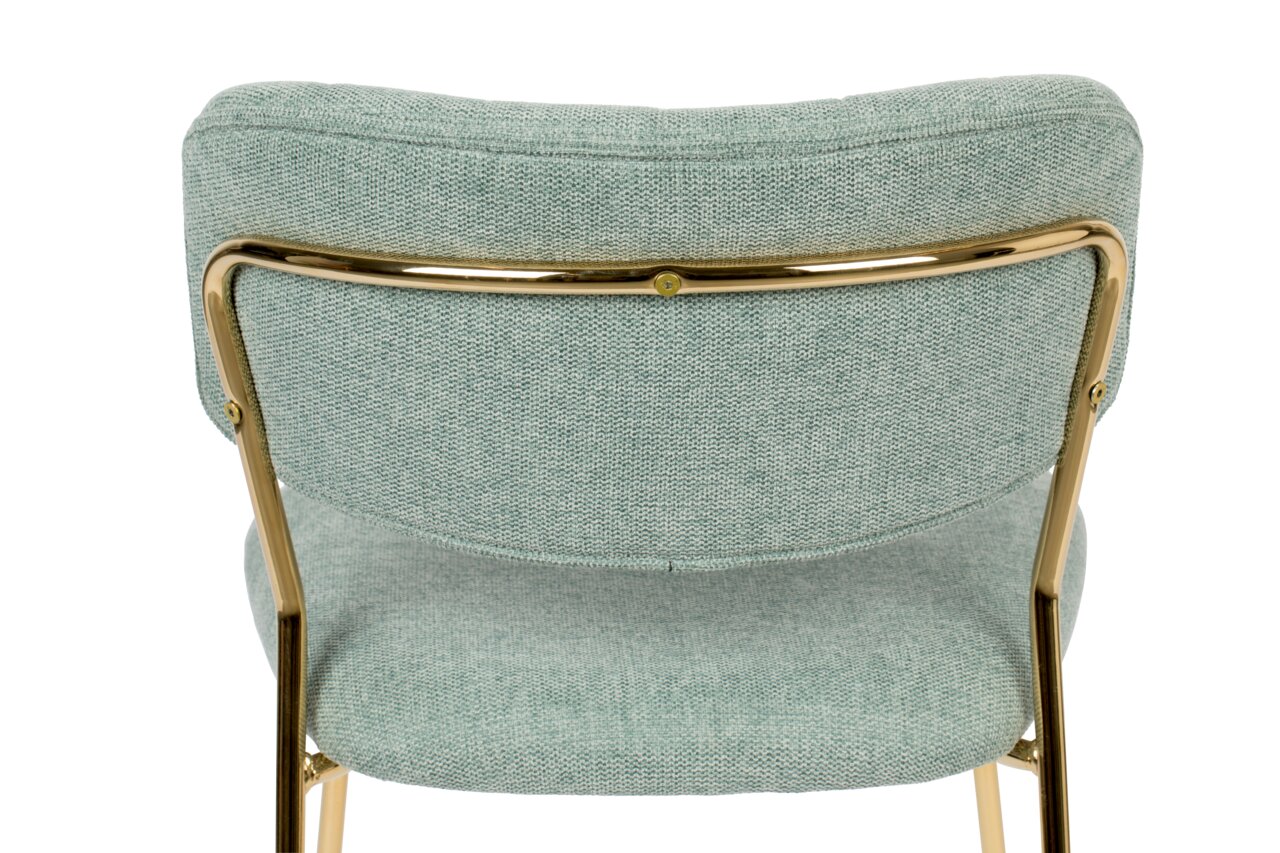 Rückansicht eines Stuhls mit grünem Stoffbezug und goldfarbenem Metallrahmen.