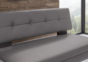 Graue Eckbank mit gepolsterter Rückenlehne, seitliche Perspektive