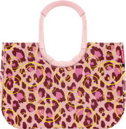 Rosa Handtasche mit Leopardenmuster und gelben Smiley-Prints, mit rundem Tragegriff, frontal von vorne auf weißem Hintergrund abgebildet.