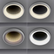 Vier runde, eingelassene LED-Deckenspots in einer grauen Decke, jeweils in unterschiedlichen Ausführungen (Wabenraster/Reflektor und schwarze Abdeckung) mit warmweißem Lichtkranz, Ansicht schräg von unten.