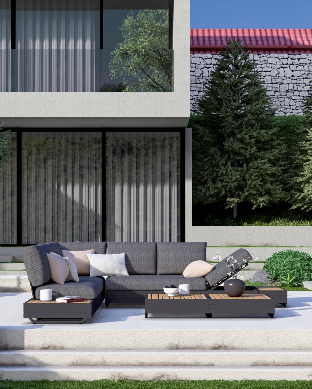 Moderne tuinmeubelset met grijze hoekbank en salontafels op een terras, gezien van voren.
