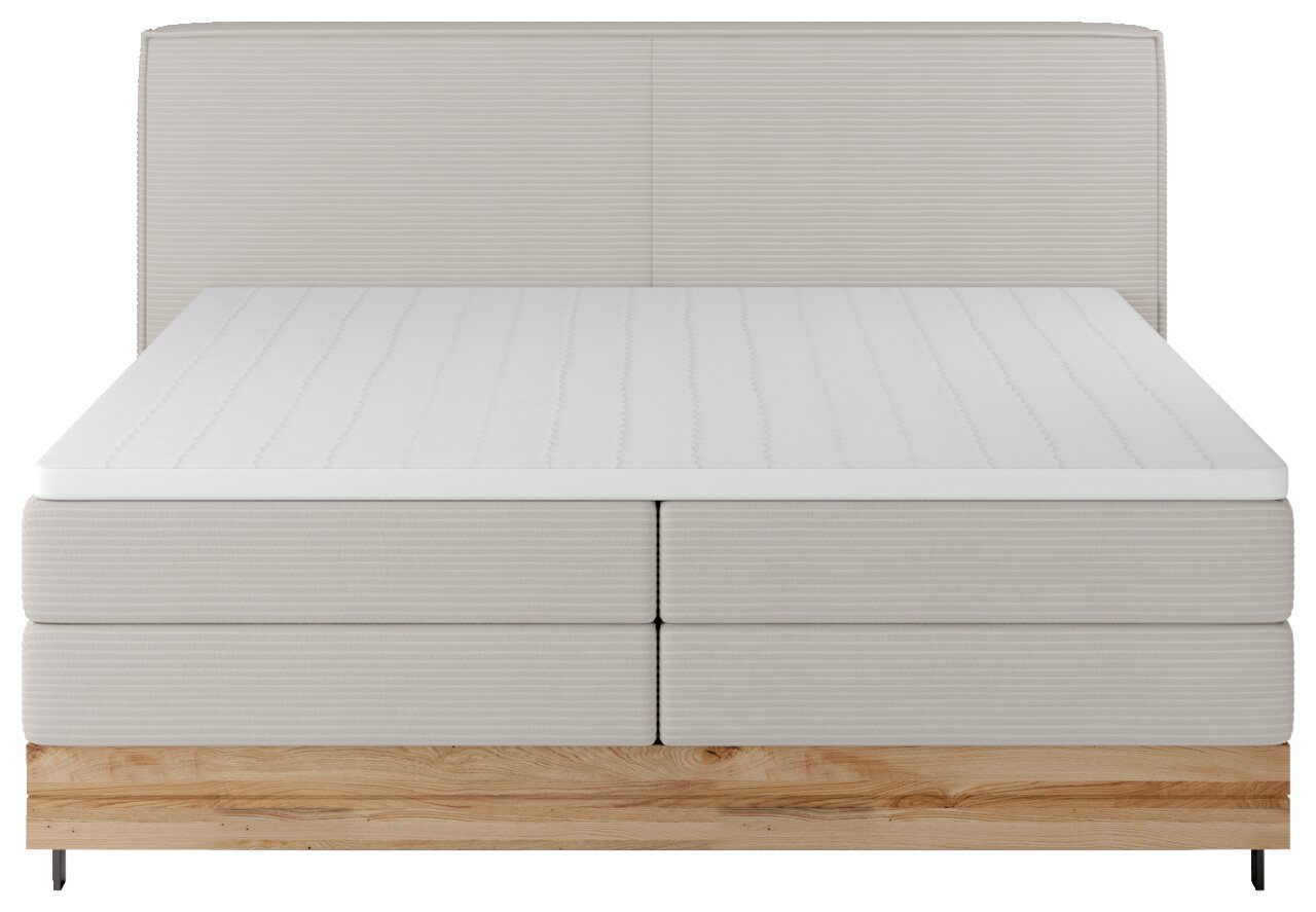 Boxspringbett in Frontalansicht mit hellgrauem Stoffbezug und Holzfußteil