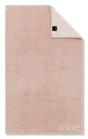 Gästetuch in zartem Rosa mit umgeschlagener Ecke, Markenlogo sichtbar, Draufsicht