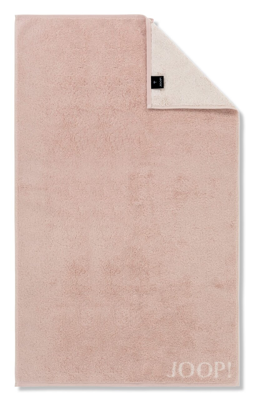 Gästetuch in zartem Rosa mit umgeschlagener Ecke, Markenlogo sichtbar, Draufsicht