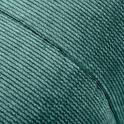 Nahaufnahme eines grünen, strukturierten Stoffes eines Hockers