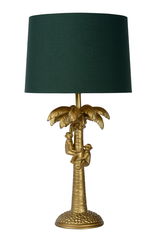 Goldene Tischlampe in Form einer Palme mit zwei Affen, die den Stamm hinaufklettern, und einem grünen Lampenschirm, frontal betrachtet.