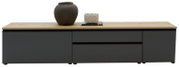Modernes Sideboard/Lowboard in Anthrazit mit heller Holzplatte, mittig zwei Schubladen und seitlich zwei Türen, mit Deko auf der Oberseite, Frontansicht