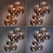 Moderne LED-Pendelleuchte mit mehreren kugelförmigen, rauchgrauen Glaskörpern, aus der Perspektive von unten betrachtet.