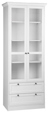 Weiße Vitrine mit Glastüren und Schubladen, frontal fotografiert.