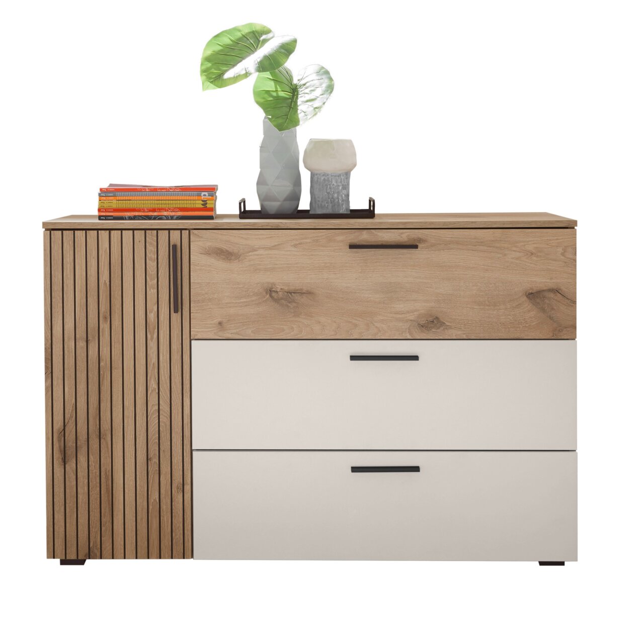 Commode in hout- en wittinten, met twee lades en een deur, versierd met planten en boeken, vooraanzicht.