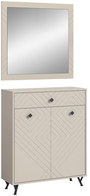 Garderobenkombination bestehend aus einem rechteckigen Spiegel und einem Schrank mit geometrischem Muster, aus frontaler Perspektive.