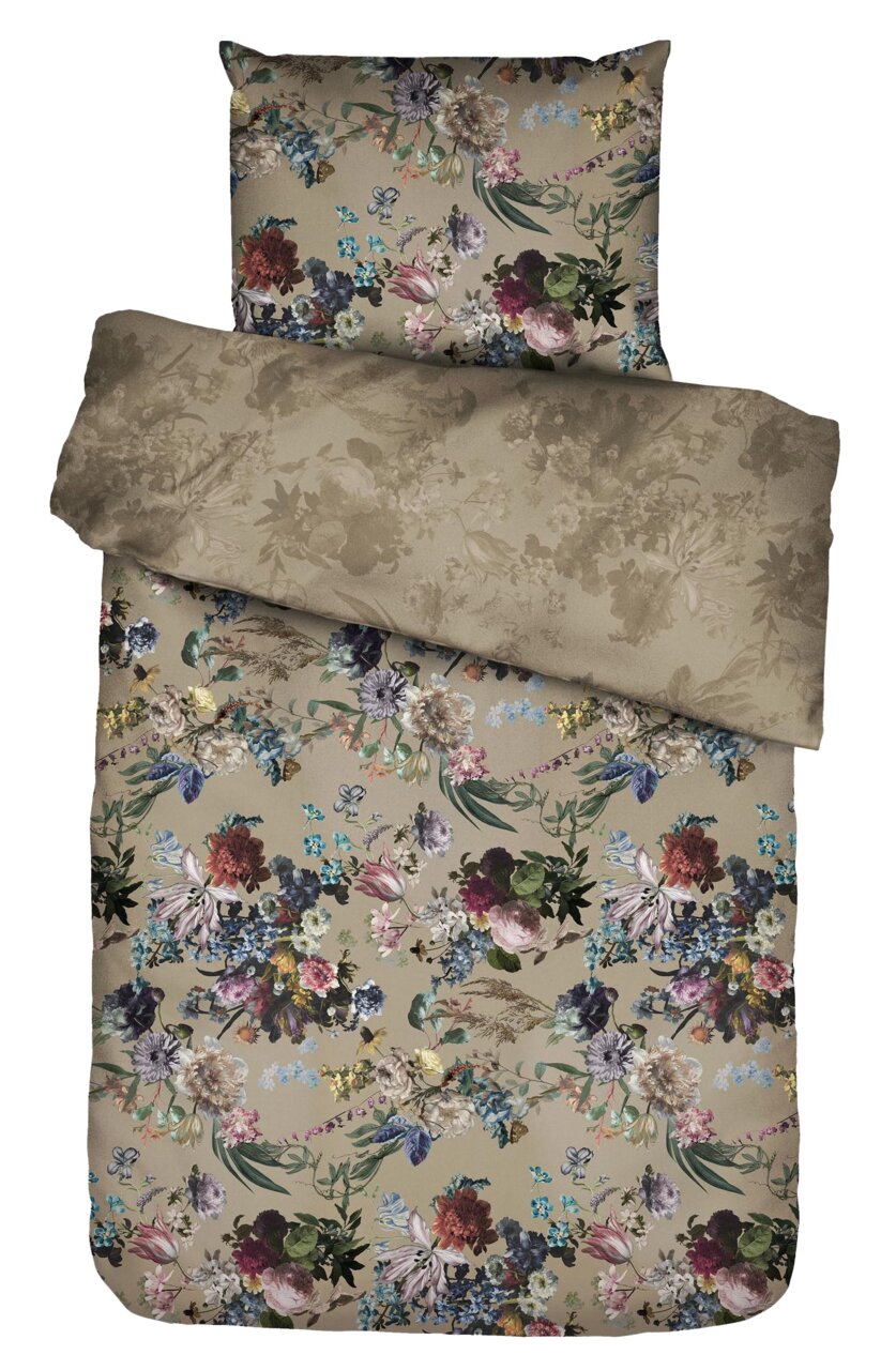 Bettwäsche-Set mit floralem Muster in Beige und bunten Blumen, aus der Vogelperspektive fotografiert.