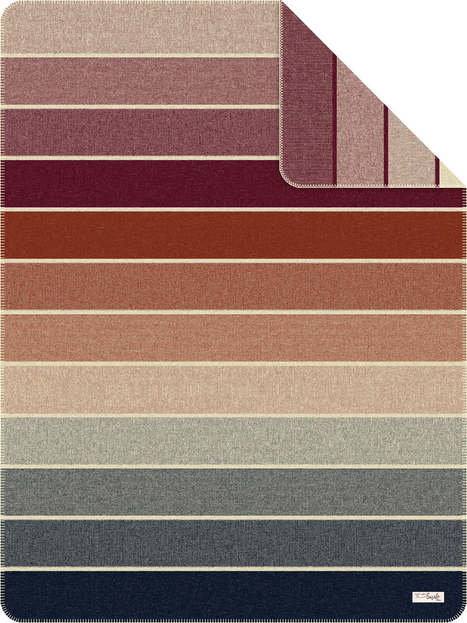 Jacquard Decke mit Streifenmuster in verschiedenen Farben, von oben betrachtet