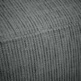 Nahaufnahme eines strukturierten Stoffes in Grau, perspektivisch von oben fotografiert.