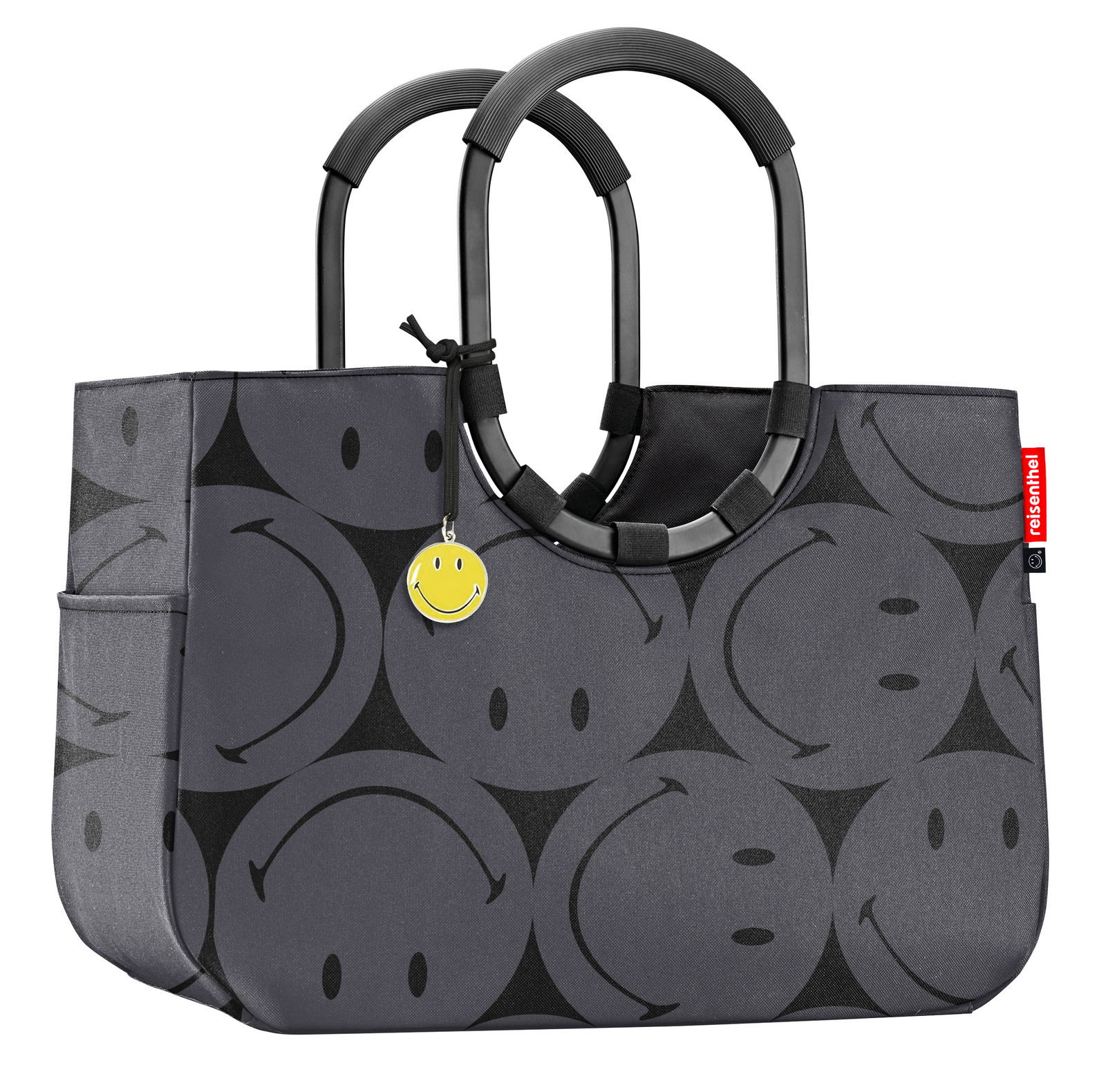 Graue Einkaufstasche mit schwarzen Smiley-Motiven und runden Griffen, seitliche Perspektive