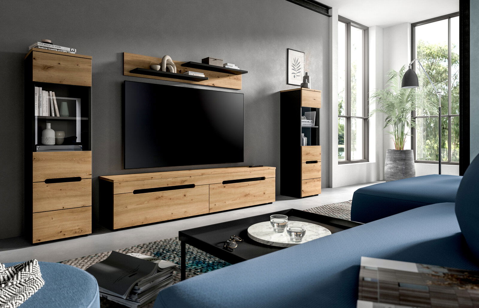 Modernes Wohnzimmer mit TV-Wandmöbel-Set in Holzoptik und Schwarz, bestehend aus Lowboard, zwei Vitrinen und Wandregal, frontal in leichter Schrägansicht von links fotografiert.