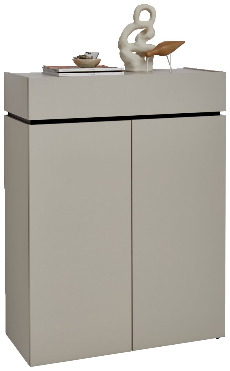 Moderner Schuhschrank in minimalistischem Design mit zwei Türen, dekoriert mit Skulptur und Büchern, Frontalansicht.