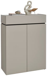 Moderner Schuhschrank in minimalistischem Design mit zwei Türen, dekoriert mit Skulptur und Büchern, Frontalansicht.