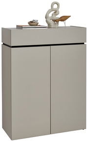 Moderner Schuhschrank in minimalistischem Design mit zwei Türen, dekoriert mit Skulptur und Büchern, Frontalansicht.