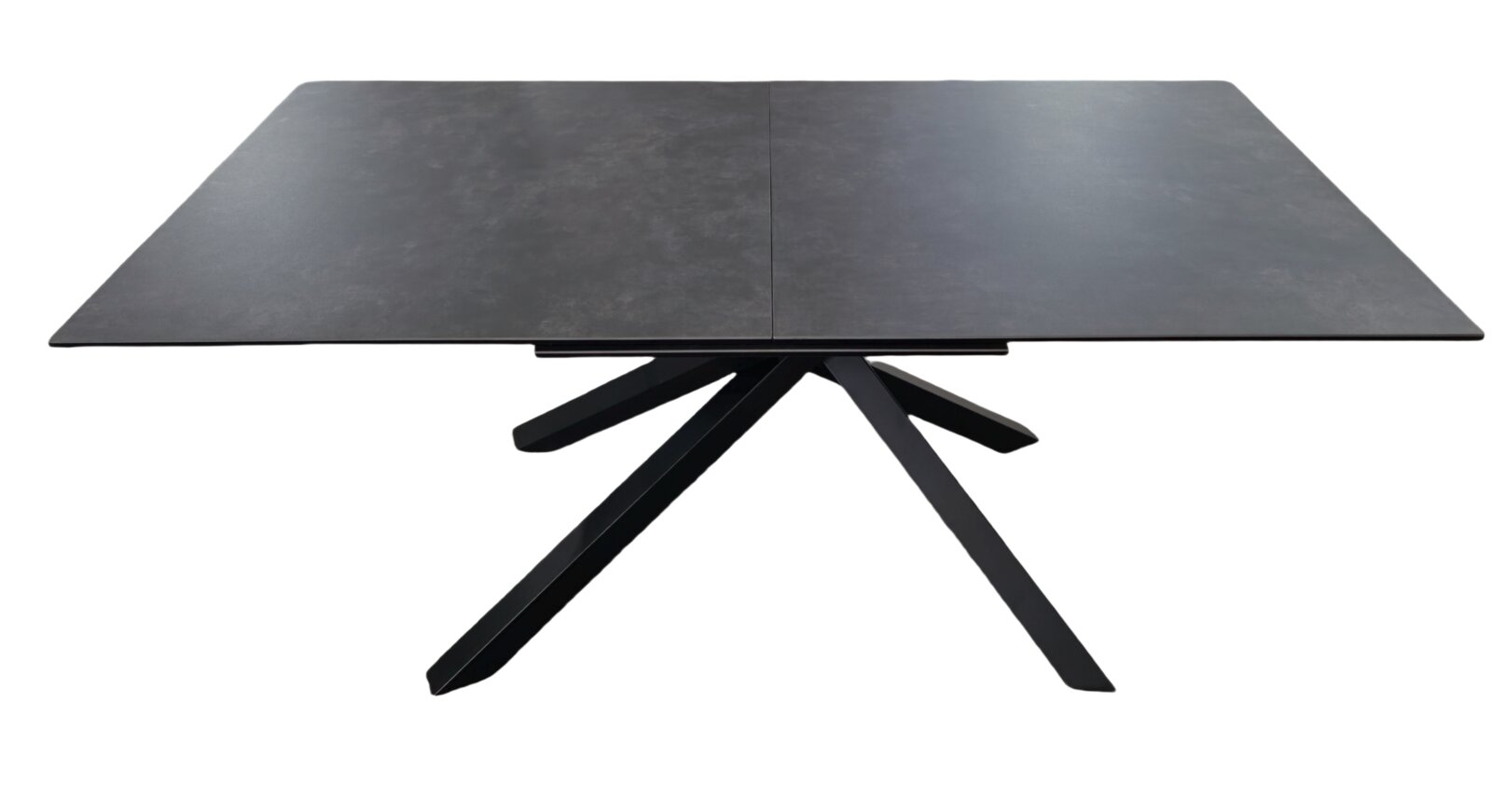 Moderner Esstisch mit dunkler Tischplatte und einzigartigem, geometrischem Untergestell, seitliche Perspektive.
