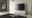 Modernes TV-Lowboard in Weiß mit Hochglanzoberfläche, frontal betrachtet, in einem stilvollen Wohnzimmer mit großem Flachbildfernseher, Kunstwerk an der Wand und eleganter Stehlampe.