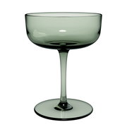 Elegante grüne Sekt- und Dessertschale aus Glas, seitliche Ansicht.