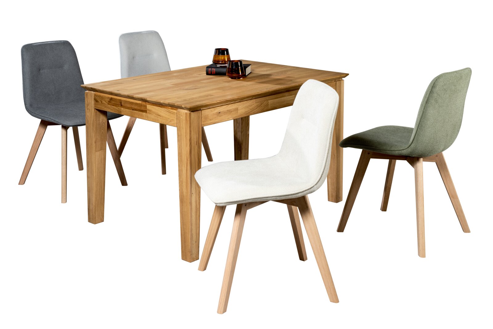 Zurbrüggen Esstisch 140x90 MINI+ Holz-Esstisch mit vier gepolsterten Stühlen in Grau, Weiß und Grün, auf weißem Hintergrund, Perspektive: schräg von vorn/leicht von oben