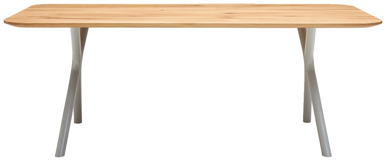 Moderner Esstisch mit Holzplatte und geschwungenen weißen Beinen, Frontalansicht.