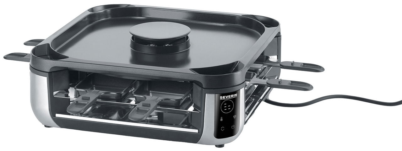 Smokeless Raclette-Grill von schräg vorne mit mehreren Pfännchen und glatter Grillplatte.