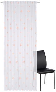 Fertigvorhang mit rosa Sternenmuster, frontal fotografiert, neben einem schwarzen Stuhl.
