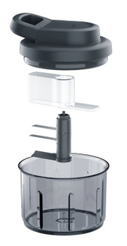 Exploded view van een compacte keukenhakmolen met transparante kom, messenunit, invoerhulp en donkergrijs deksel, schuin van voren op witte achtergrond