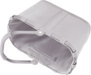 Graue, gerippte Aufbewahrungstasche mit Reißverschlussfach und klappbarem Metallrahmen/Griff, schräg von oben in Seitenansicht fotografiert.