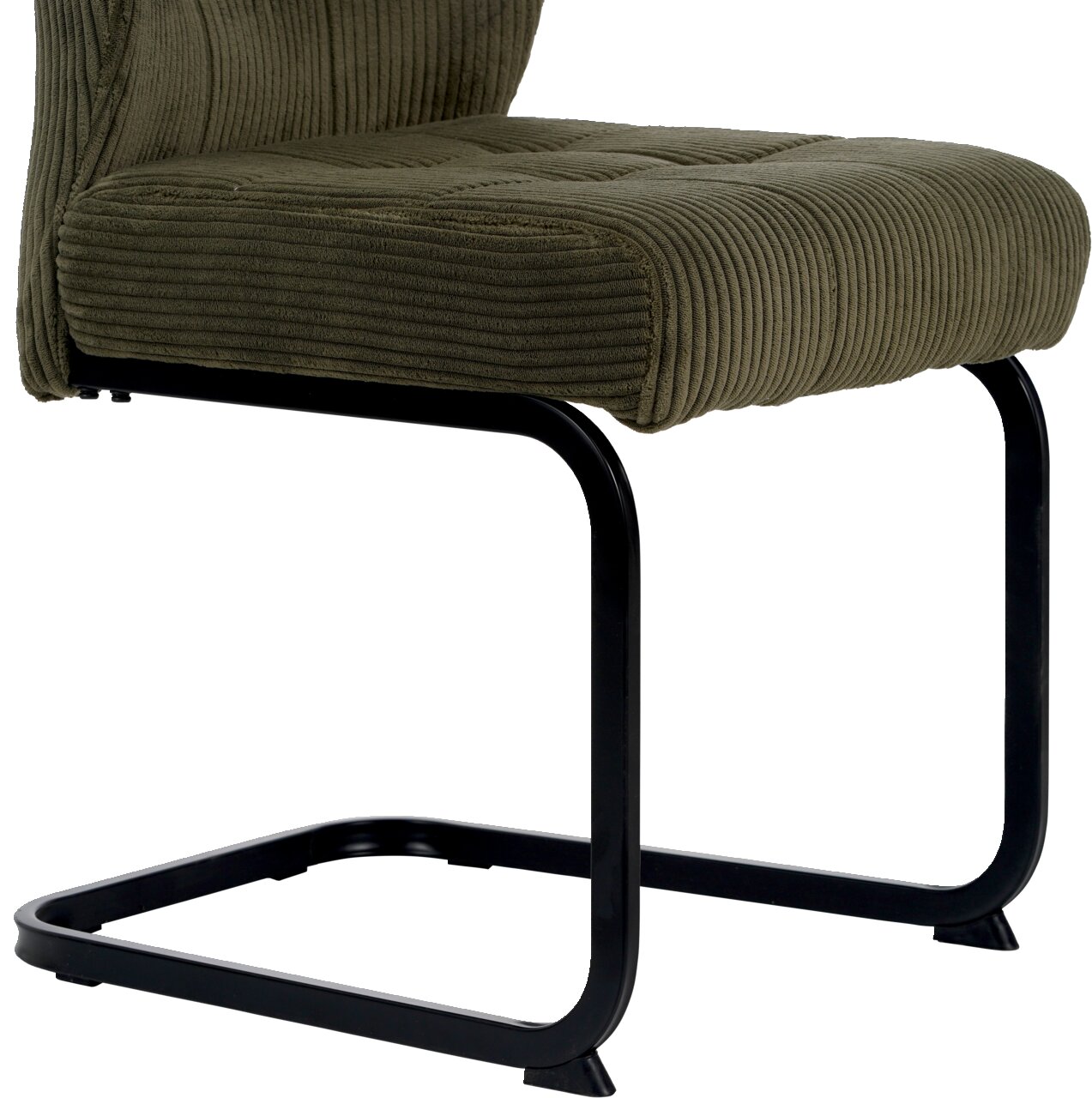 Grüner Schwingstuhl mit schwarzem Metallgestell, seitliche Perspektive