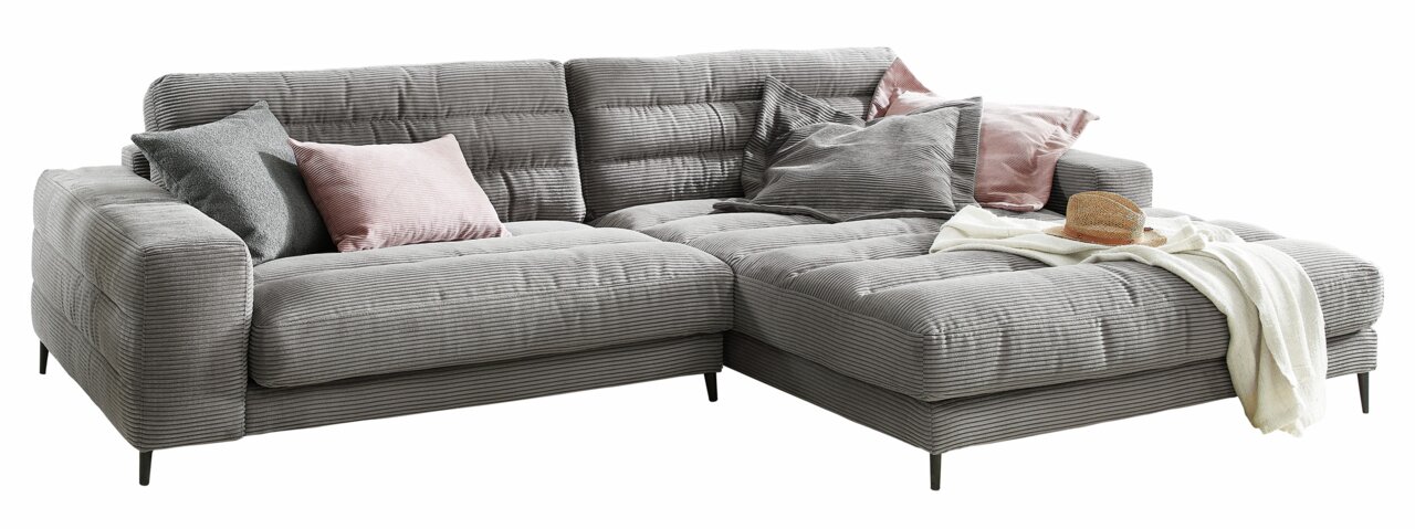 Dieter Knoll Longchair-combinatie BADIA 2.0 Grijze longchair-set met verschillende kussens in diverse kleuren, gefotografeerd vanuit een licht zijdelingse hoek.
