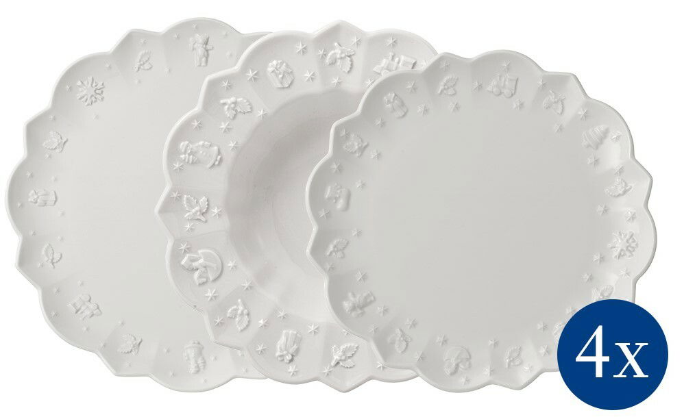 Dreier-Set von weißen Tellern mit geprägten weihnachtlichen Motiven, von oben betrachtet.