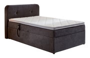 Boxbett mit Motor in seitlicher Perspektive, dunkelgrau mit weißer Matratze und Kopfteil.