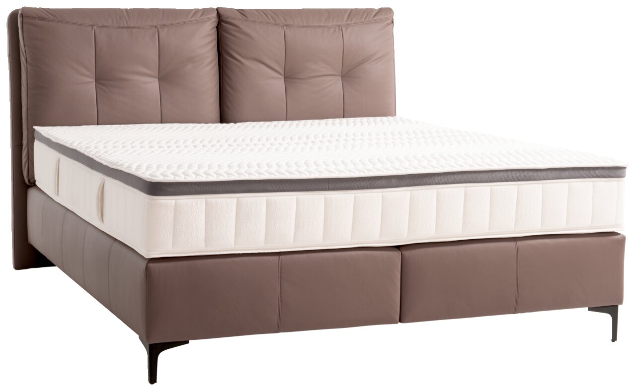 Boxspringbett mit braunem Kopfteil und weißer Matratze, seitliche Perspektive