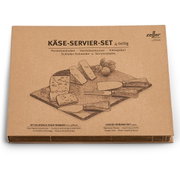 Verpackung eines 4-teiligen Käse-Servier-Sets mit Parmesan-Hobel, Hartkäsemesser, Käsegabel und Schiefer-Schneide- und Servierplatte, aus der Vogelperspektive.