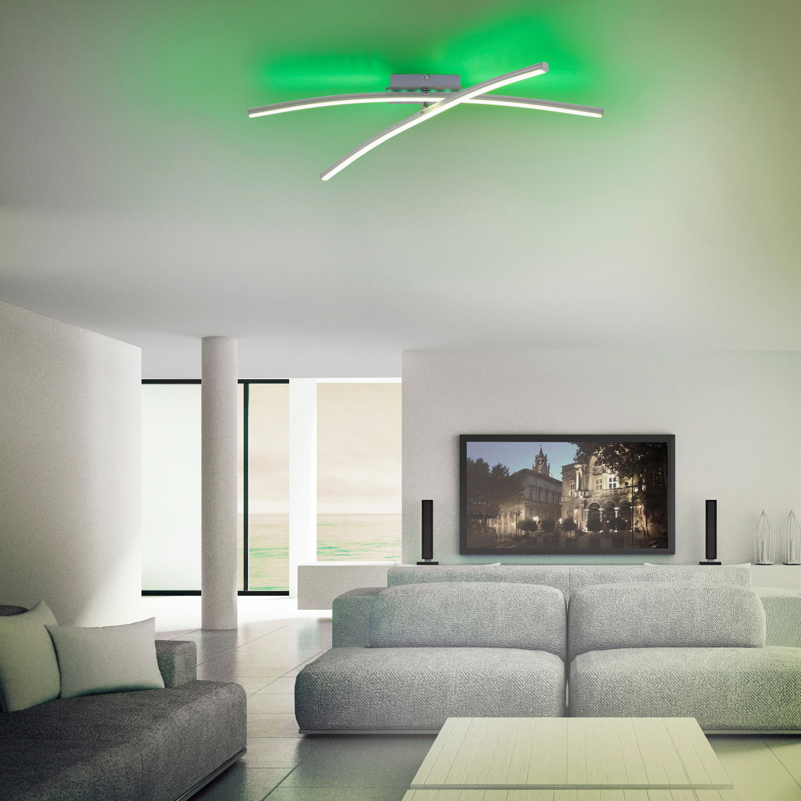 Moderne Deckenleuchte ALINA mit geschwungenem Design und grünem Licht, von unten betrachtet in einem stilvollen Wohnzimmer.