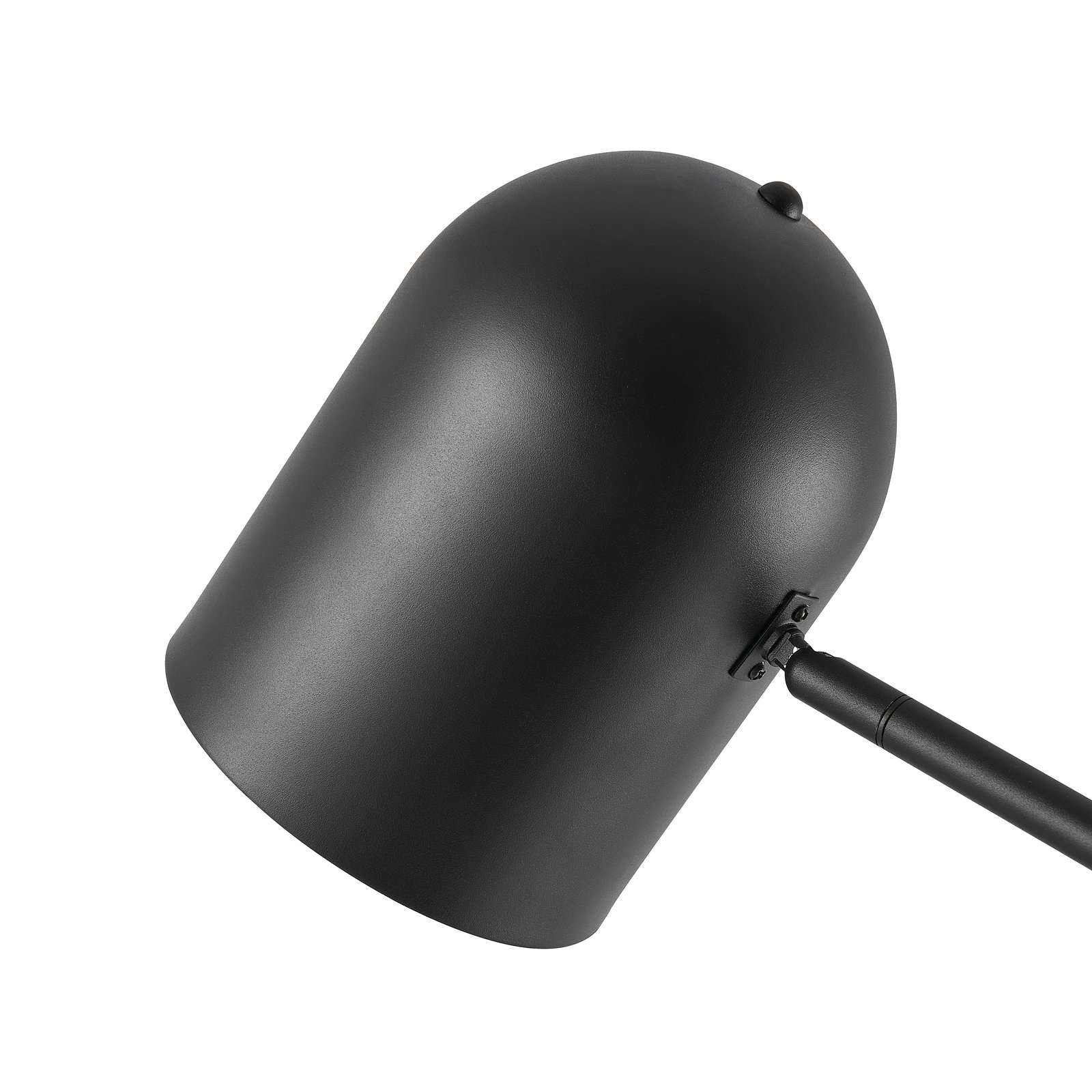 Close-up van een moderne, zwarte staande lamp met een afgeronde lampenkap.