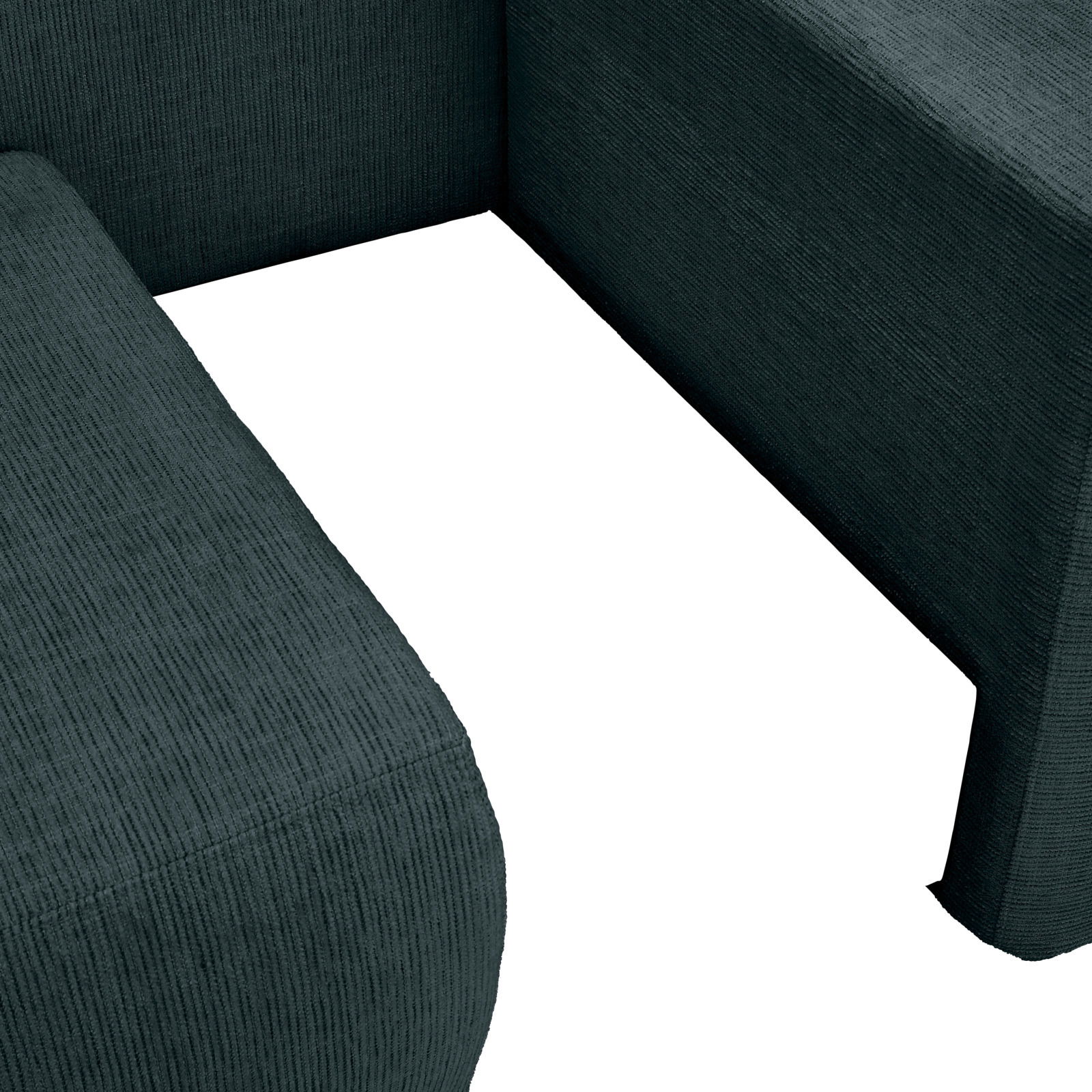 Nahaufnahme einer dunkelgrünen Recamiere mit strukturiertem Stoff, Perspektive von oben.