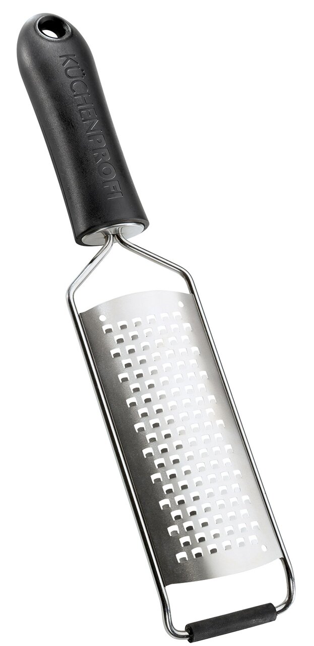 Große Küchenreibe mit schwarzem Griff, seitliche Perspektive