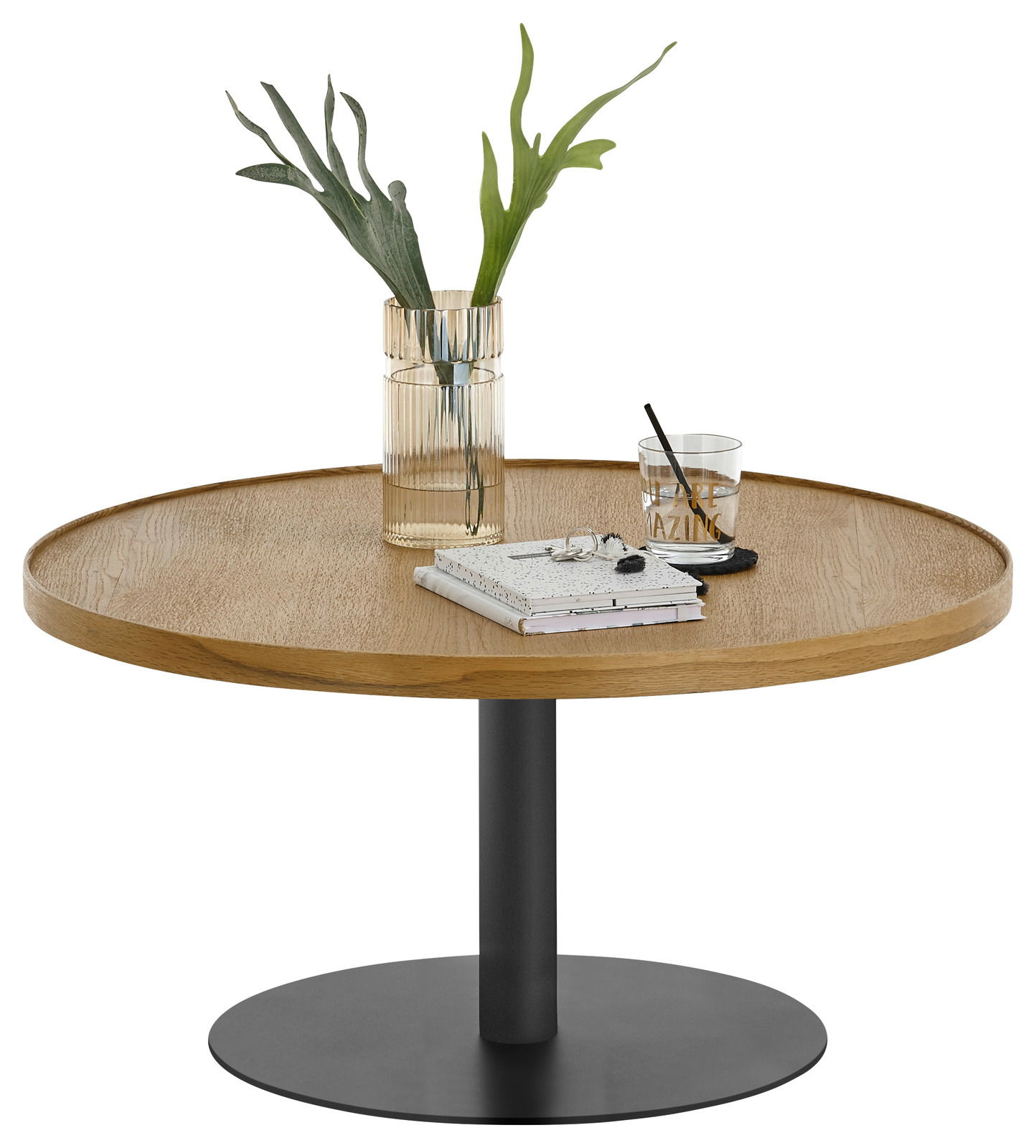 Runder Couchtisch mit Holzplatte und schwarzem Metallfuß, dekoriert mit einer Vase und einem Glas, seitliche Perspektive