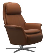 Brauner Relaxsessel aus Leder mit verstellbarer Rückenlehne und modernem Metallfuß, seitliche Perspektive
