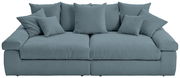 Großes, komfortables Big-Sofa in blauer Farbe mit mehreren Kissen, Vorderansicht.