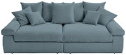 Großes, komfortables Big-Sofa in blauer Farbe mit mehreren Kissen, Vorderansicht.