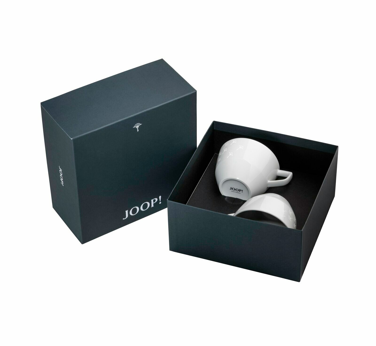 JOOP! Tasse 2er-Set DINING GLAMOUR Zwei weiße Tassen in einer eleganten schwarzen Geschenkbox von oben betrachtet, mit dem Logo 'JOOP!' auf der Unterseite der Tassen.