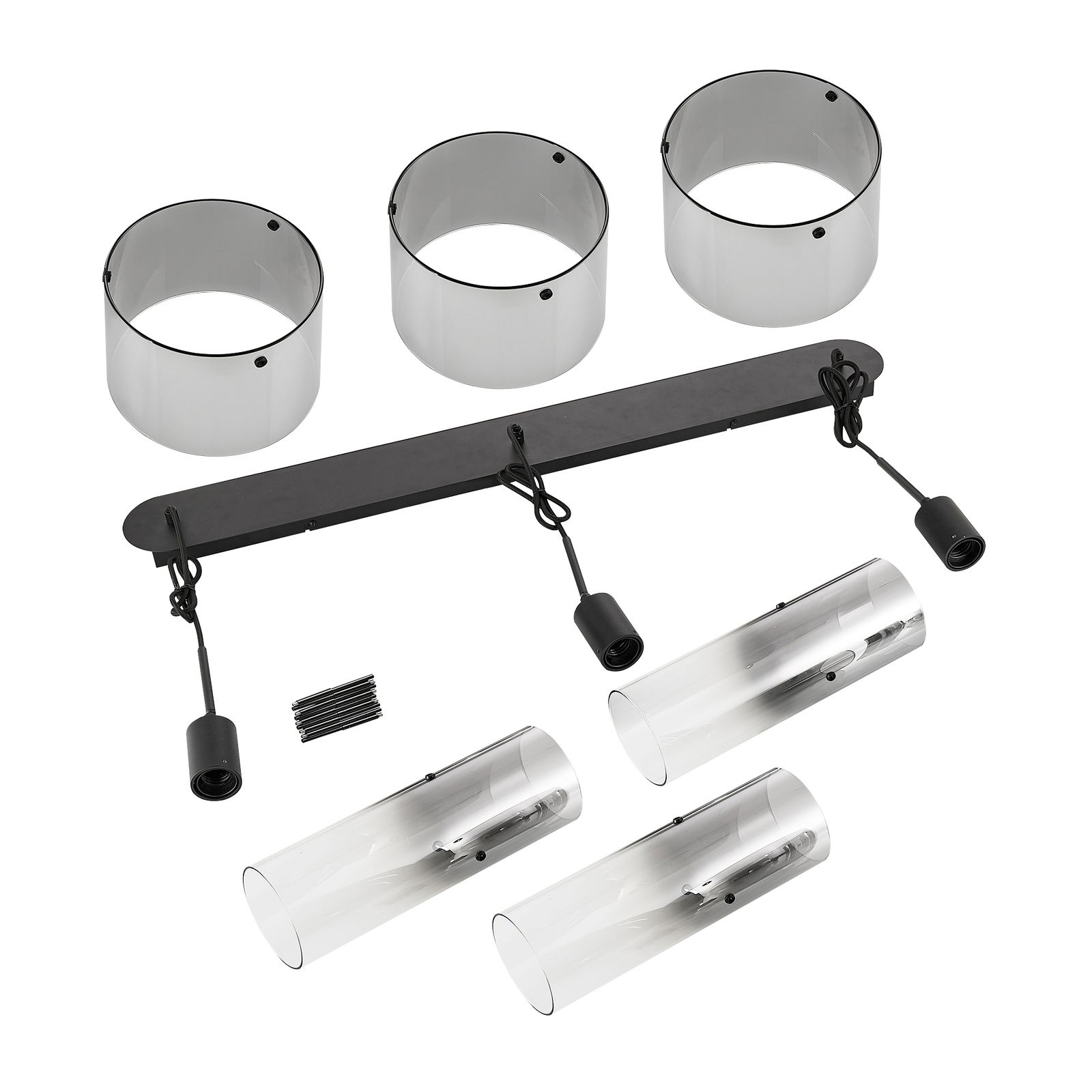 Einzelteile einer Hängeleuchte in der Draufsicht, bestehend aus drei zylindrischen Lampenschirmen, einer schwarzen Halterung und weiteren Montagematerialien.