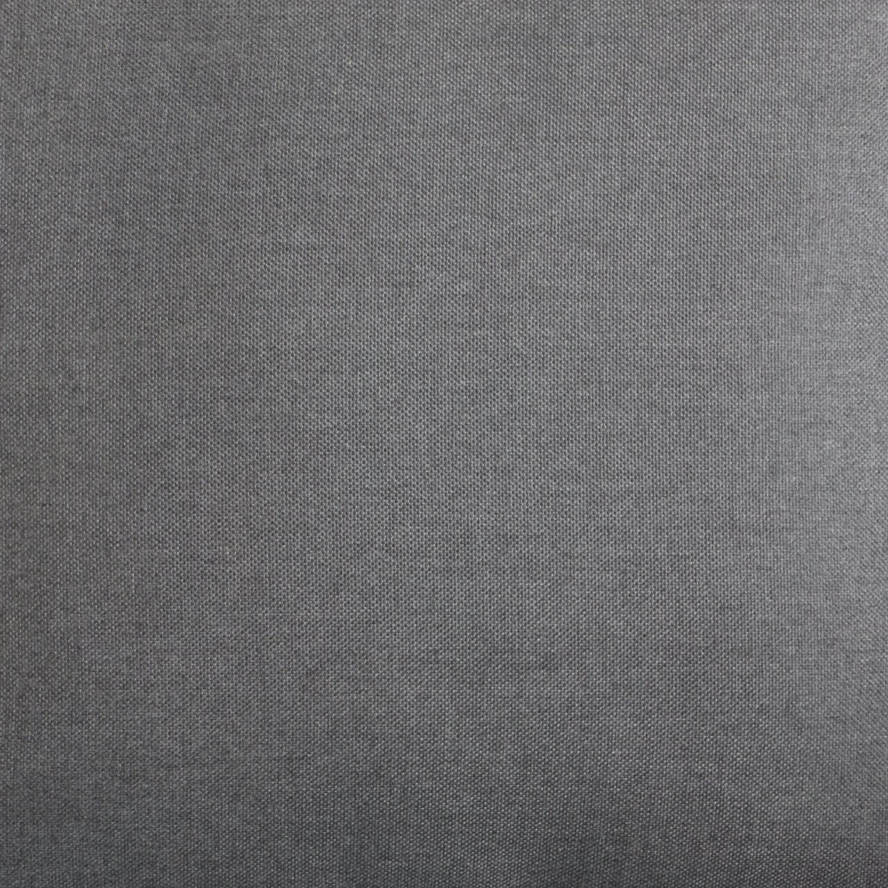 Nahaufnahme eines grauen Stoffes, der für ein Lounge-Set verwendet wird.