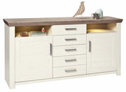 Elegantes Sideboard mit cremeweißen Türen und Schubladen, dunkler Holzplatte und dekorativen Elementen, frontal betrachtet.